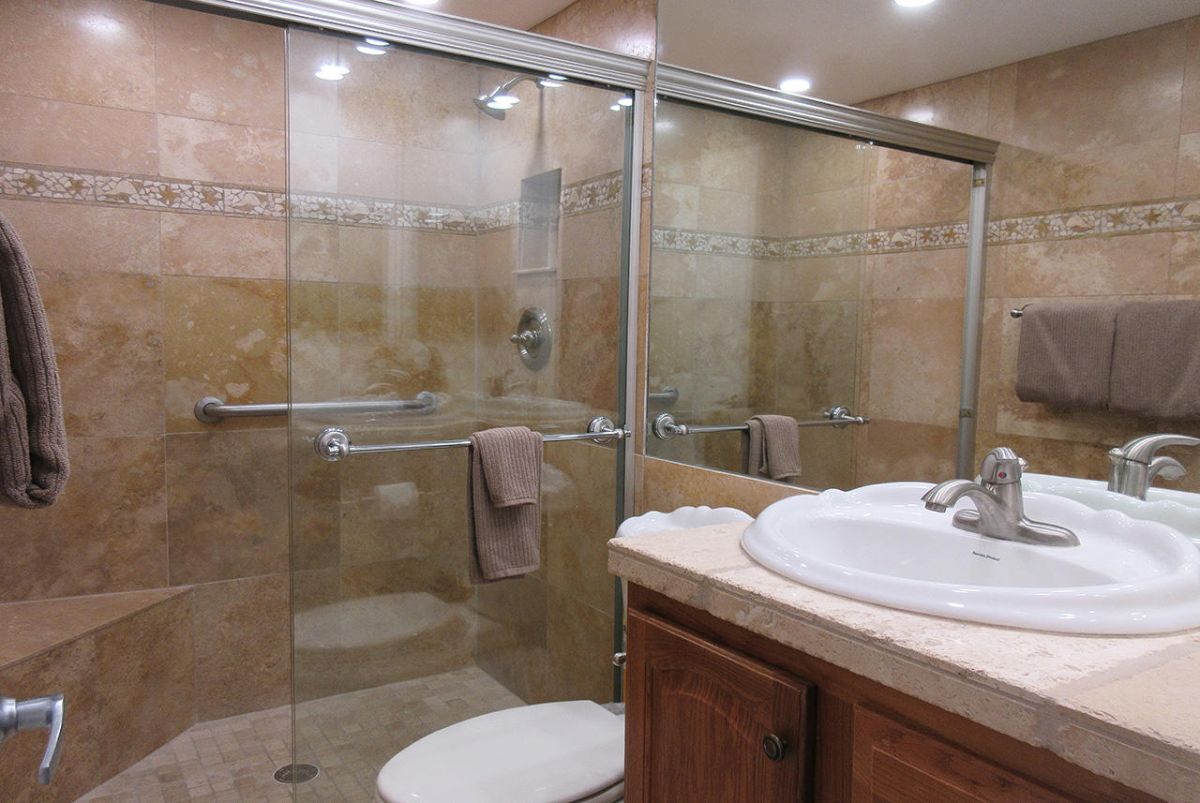 Guest Bath also features a tiled, walk in shower