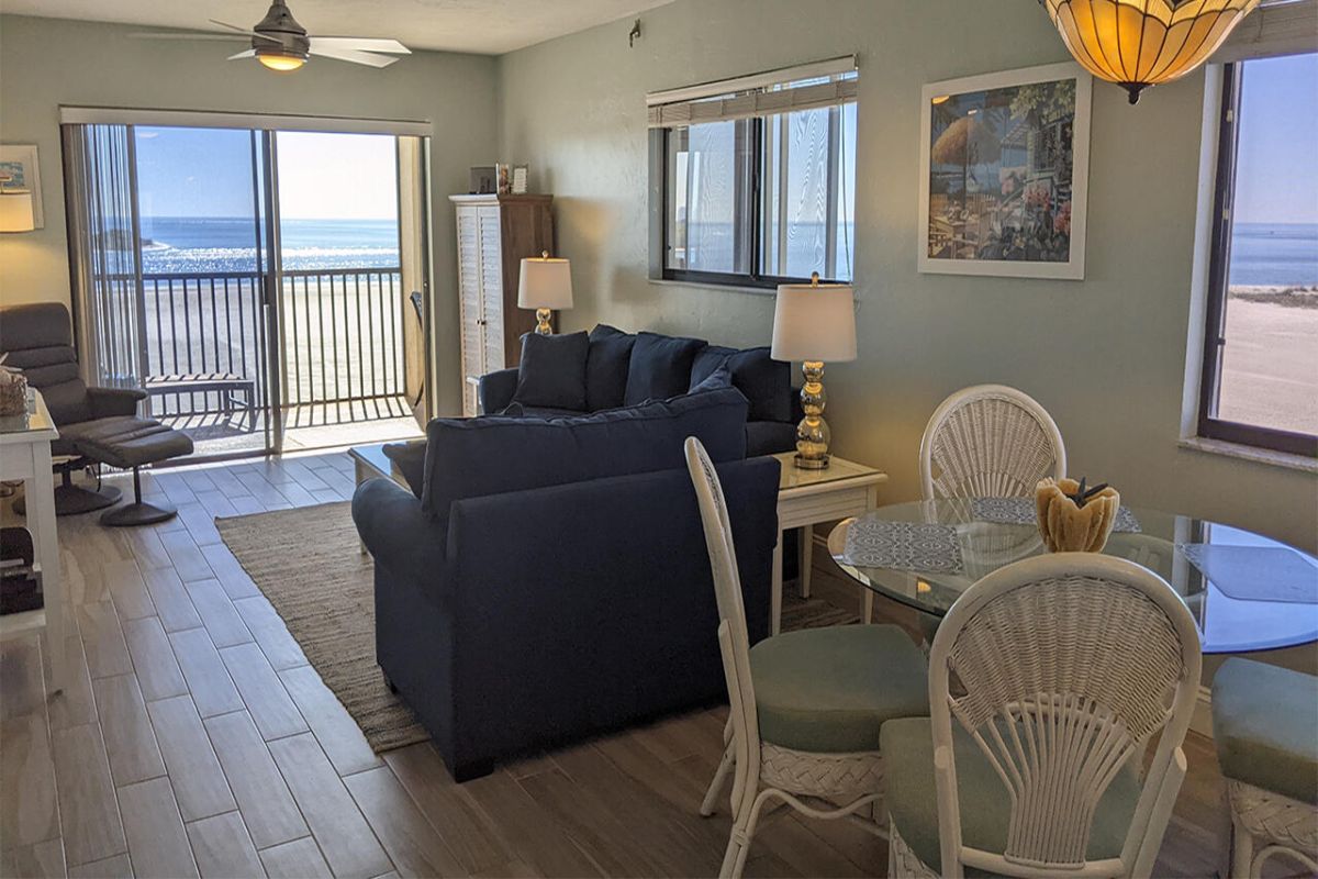 Carlos Pointe 535 has an open floor plan with tiled floors and lots of windows.