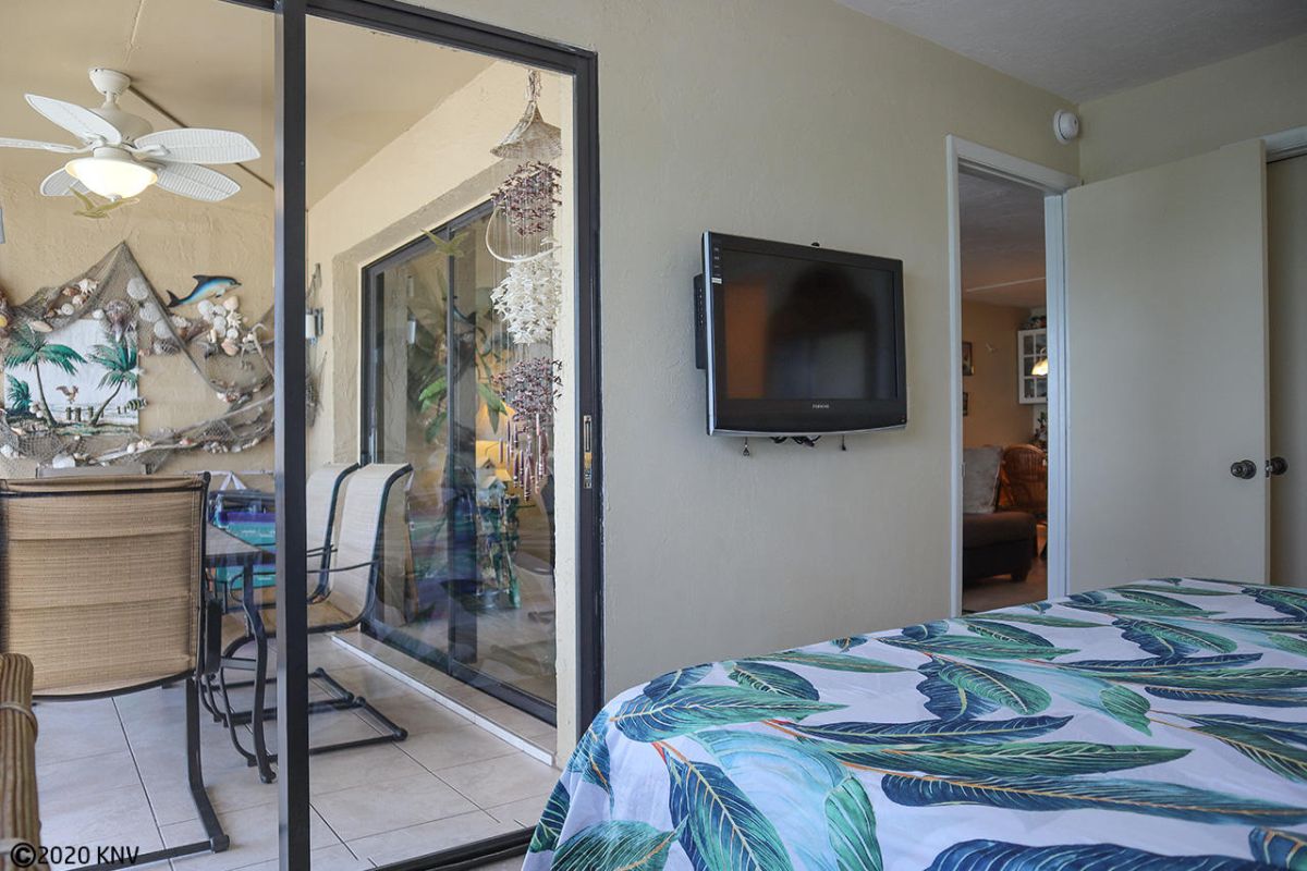 Master Bedroom has a private lanai access.