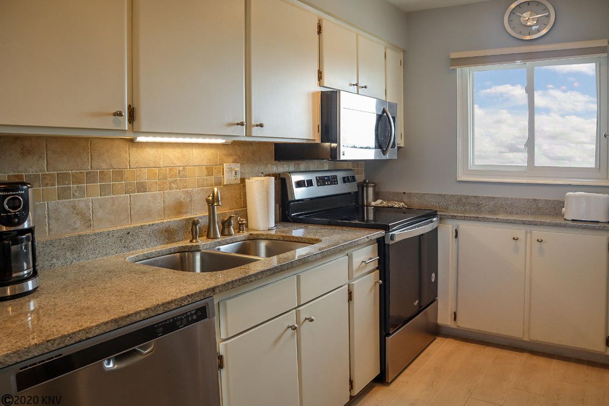 Fully Equipped Kitchen has been completely remodeled with new appliances and granite countertops