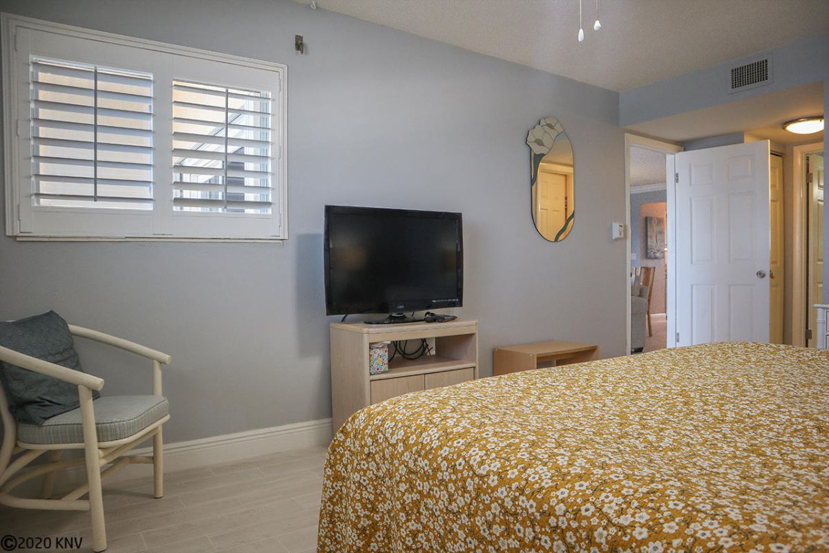 Master Bedroom En Suite enjoys a beautiful Gulf view and its own TV