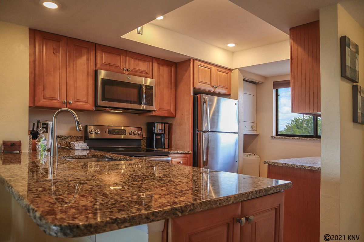 Newly Remodeled Kitchen with granite countertops.