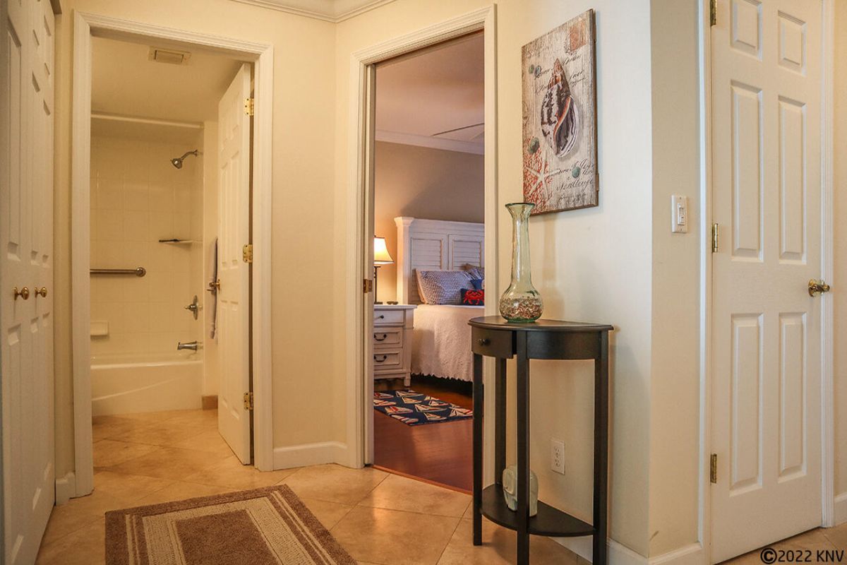 Bright hallway leads to Guest Bedroom and Guest Bath