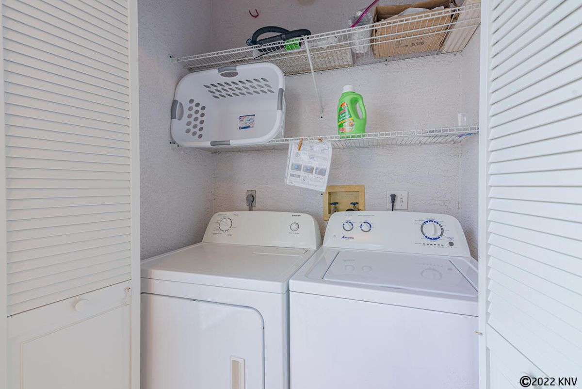 Laundry closet with full sized Washer and Dryer is located out on the Lanai