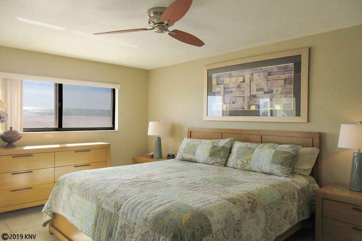 Master Bedroom has a private bath, TV, stunning views of the Gulf and direct access to the lanai.