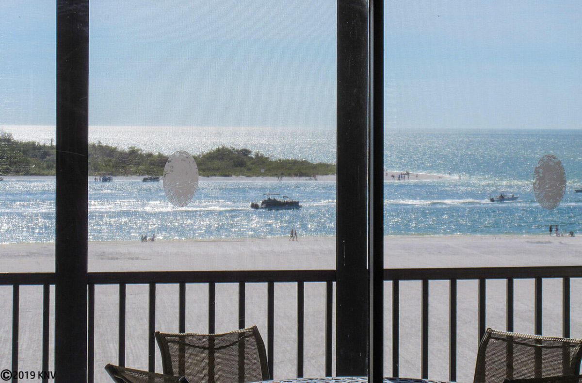 When you relax on the lanai at Carlos Pointe 523, you can watch the boats sail by on the Gulf waters