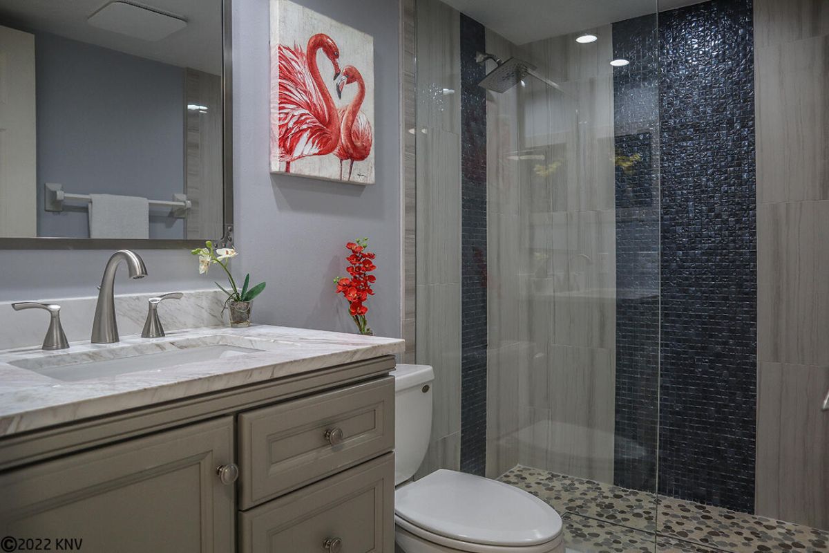 Beautifully Remodeled Guest Bath features a Walk In Shower