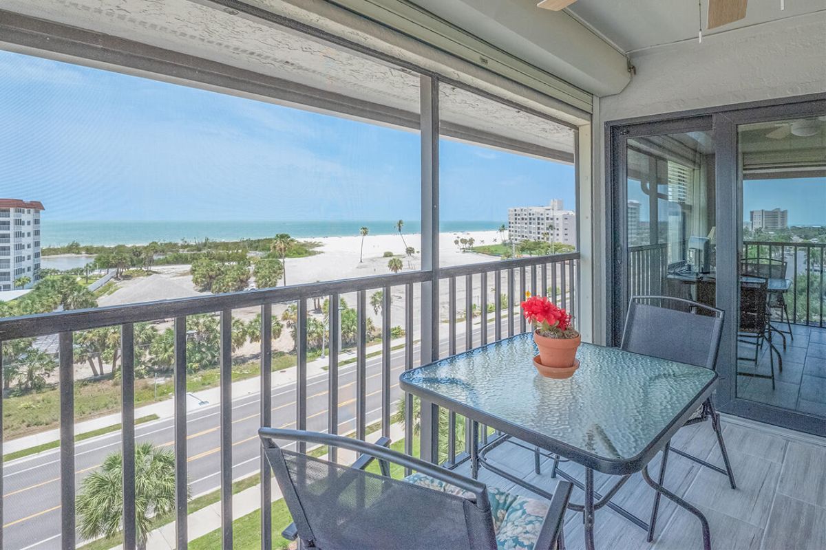 Happiness Comes In Waves! Welcome to Estero Cove 561 - a budget friendly Island Condo with a Gulf View from the Screened In Lanai