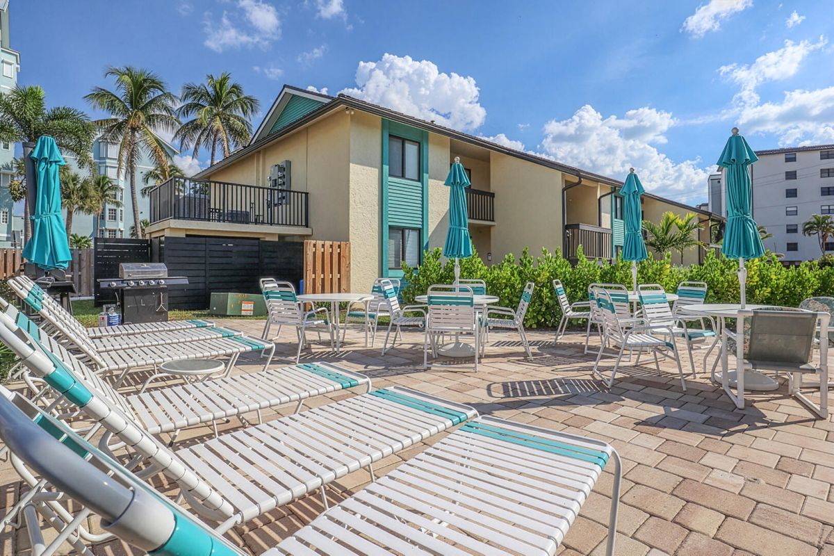 Bac Bay Sundeck and BBQ area welcomes guests to relax and take in the sunshine and the Gulf breezes.