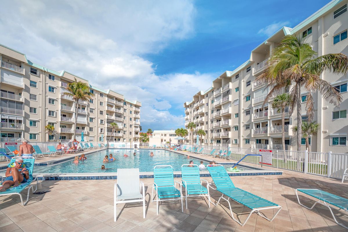 Seas The Day! Imagine yourself here! Leonardo Arms 114 is a two bedroom, two bath beachfront condo with amenities like this resort sized pool on sunny Fort Myers Beach!