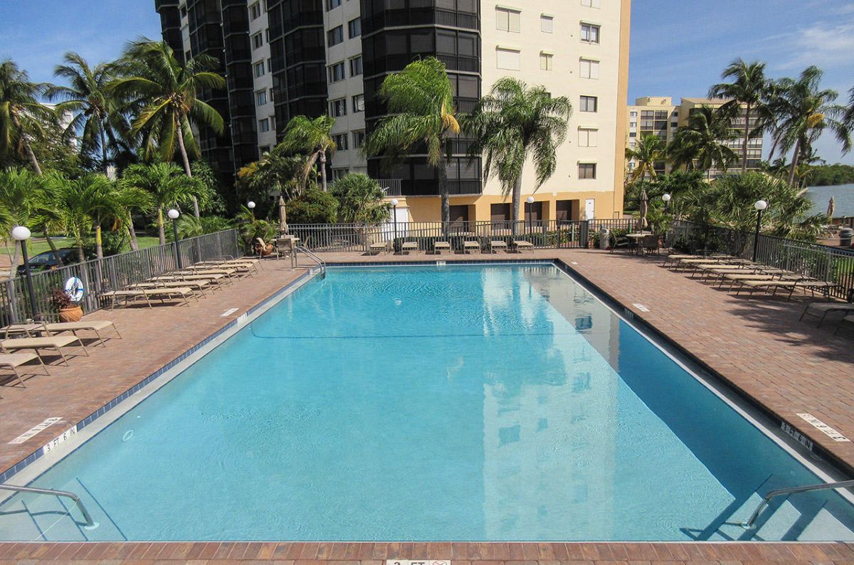 Harbour Pointe Resort Condominiums - Heated Pool Overlooking the Bay with Plenty of Lounge Chairs. H